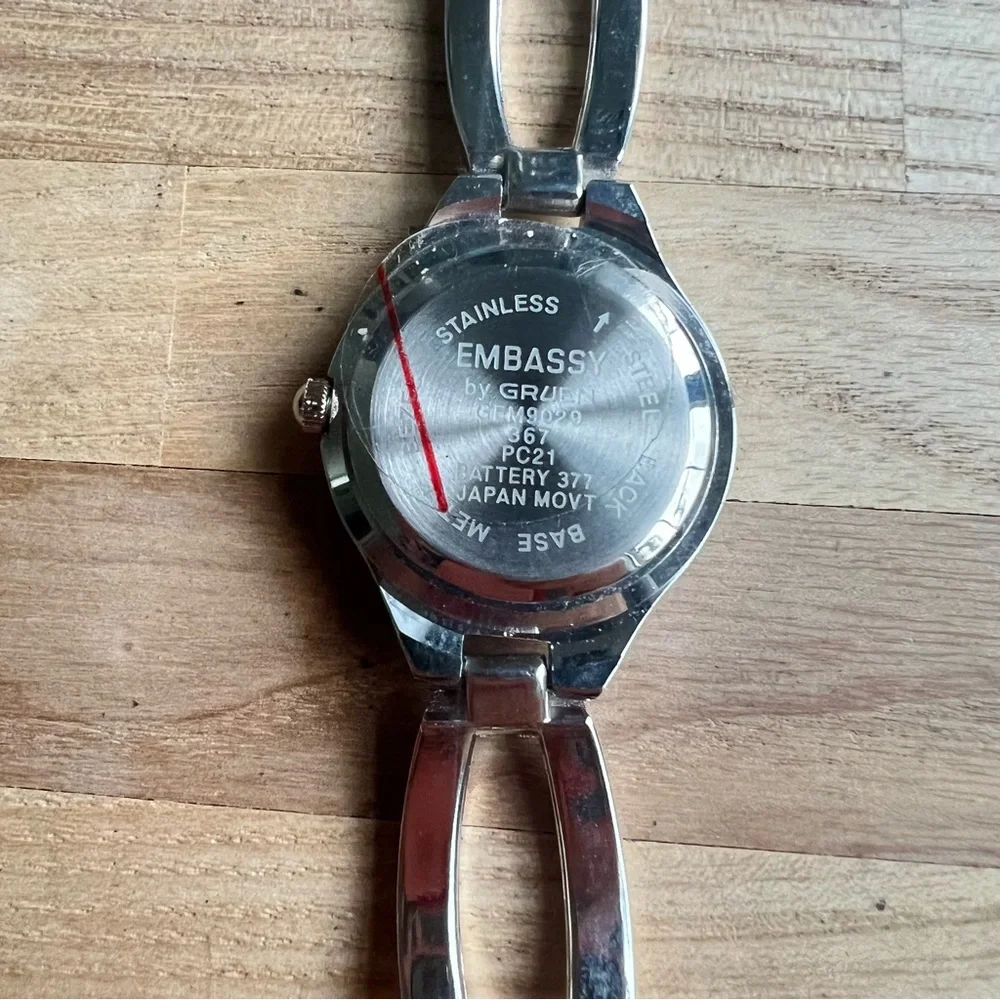 Embassy by Gruen ladies silver tone bracelet watch NEW BATTERY